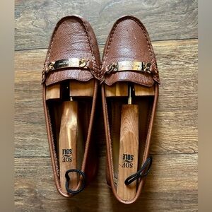 Tan and gold Coach loafers